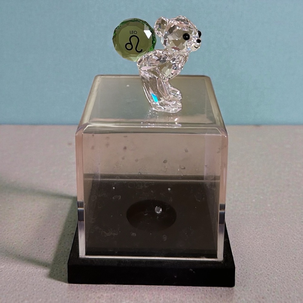 Authentic Swarovski Kris Bear figurine representing the Leo zodiac sign.